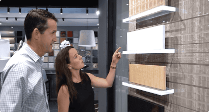 Modern interior design consultation at Brown Design Group showcasing custom shelving solutions.