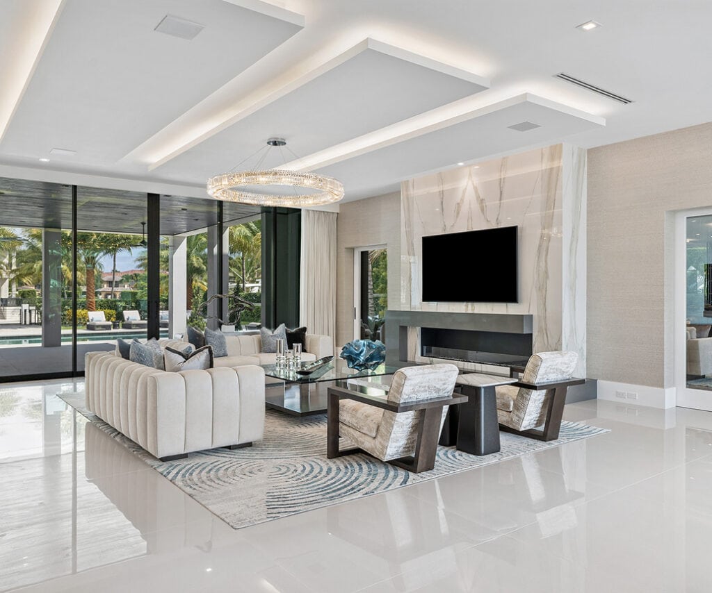 Luxurious modern living room with sleek fireplace and contemporary furniture design.