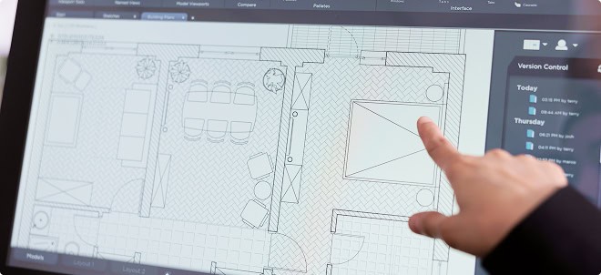Modern interior design blueprint on digital tablet, architect working on home renovation plans.